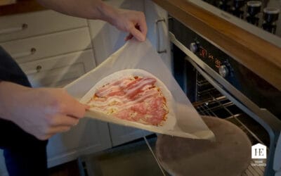 Transfer a Pizza to Stone Without a Peel with This Simple Trick